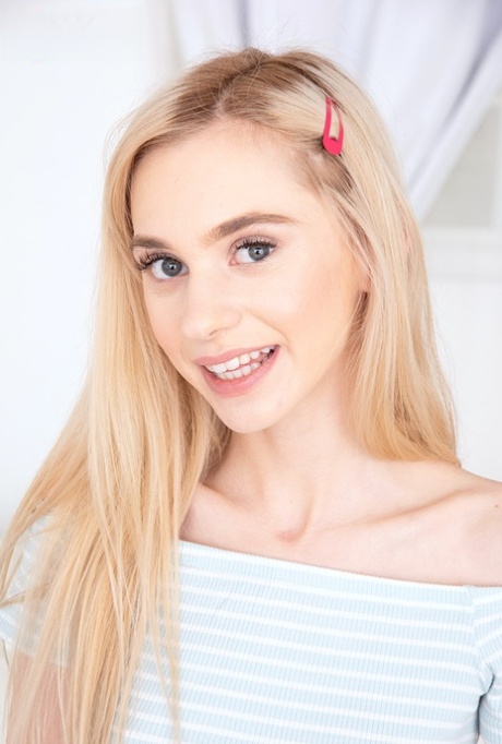 Blonde spinner Chanel Shortcake sits natural on her stepfather's lap