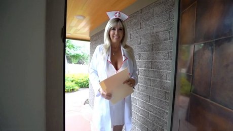 Busty housewife Sandra Otterson pleasures her husband in a nurse's outfit