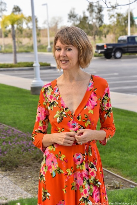 Mature wife Jamie reveals her breasts and flaunts her shaved cunt in public