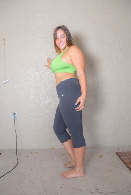 Horny Allie Giovanni with big breasts bending over natural to show her BBW curves