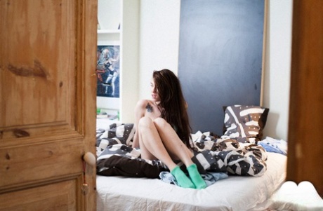 Young brunette Misha Cross gets into rough intimacy games wearing socks only