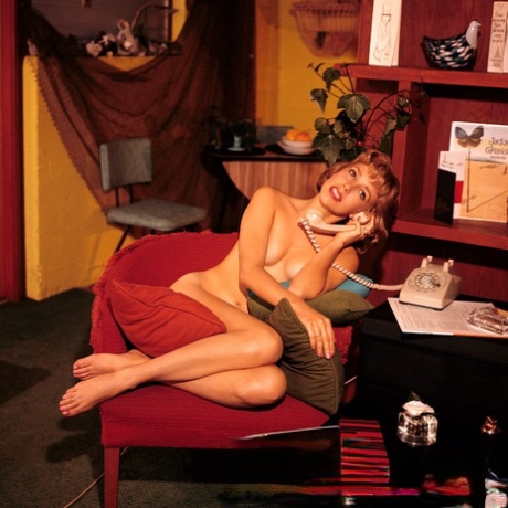 Mature Playboy goddess Sally Todd shows her slender body in different outfits