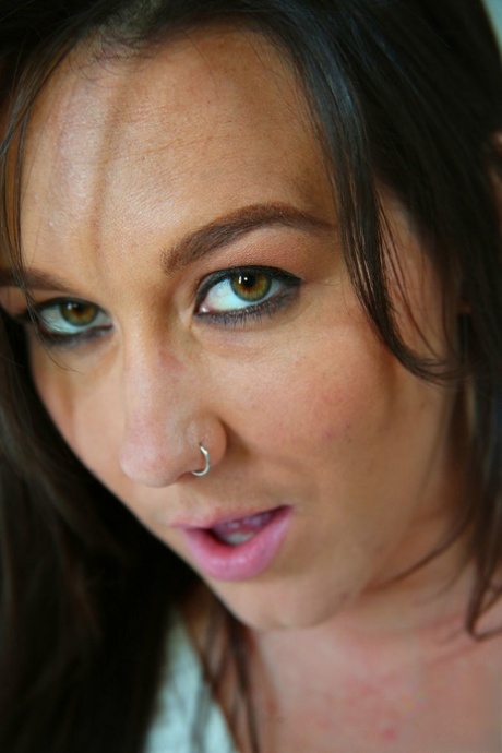 Pretty dark haired Sinn Sage produces nice big breasts & kneels for bang & blow