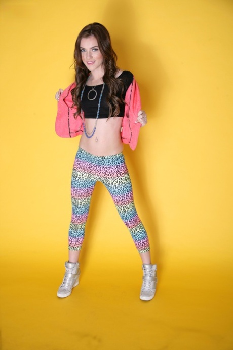 Likable girl Emma Stoned in leggings lets man take pictures of tiny titties