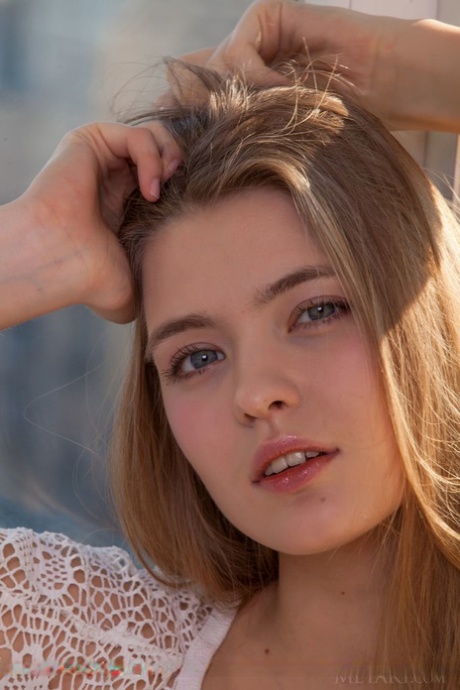 Adorable blonde sweetheart Sigrid unveils her cleanly shaved muff