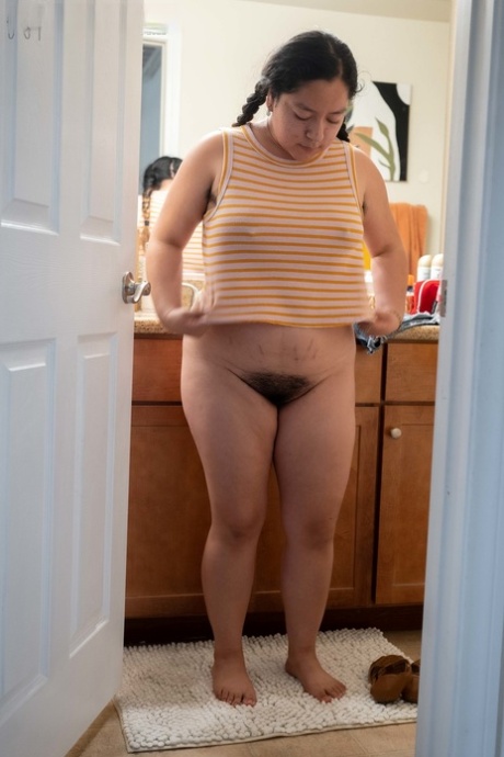 Chubby authentic Lola L shows her hairy femininity & her big curves while dressing