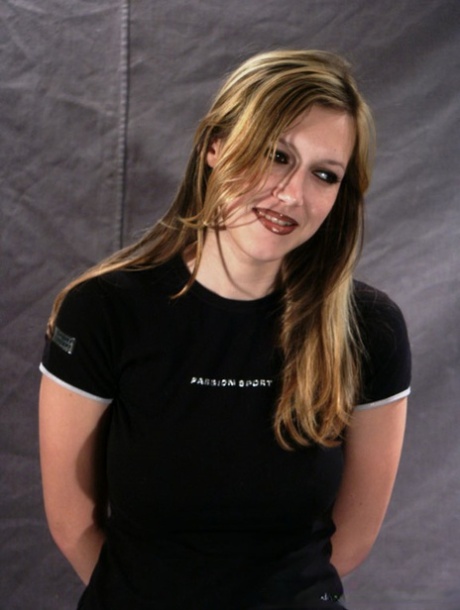 Restrained blonde girl is forced into having to smoke a cigarette