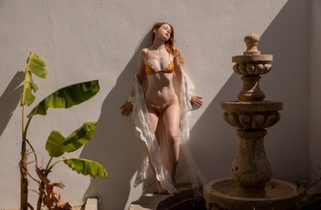 Pale redhead Erna O'Hara strikes great centerfold poses for Playboy