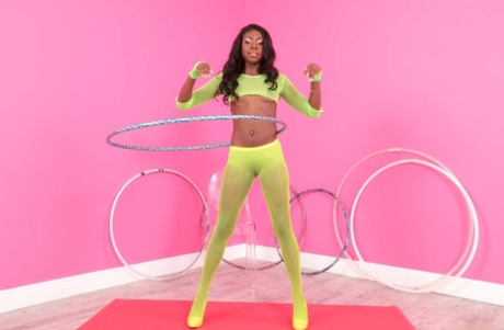 Slim black girl Anne Amari exposes her tiny titties and yummy curves in a solo