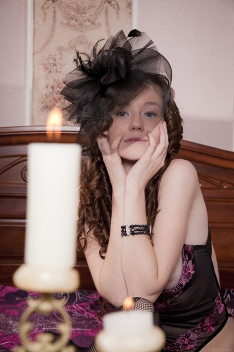 Adorable alluring young Emily Bloom masturbates her beautiful femininity in fishnet