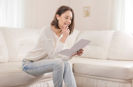 Alluring young adult slides out of her jeans to spread & masturbate natural on the couch
