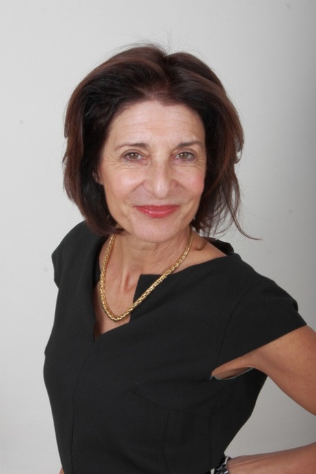 Mature beauty Emanuelle humps her younger lover's manhood and gets jizzed