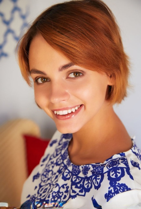 Redhead young adult Lilit A proudly shows her edible femininity with no clothes on