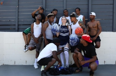 Young adult cheerleader Arietta Adams gets nailed in an interracial gangbang