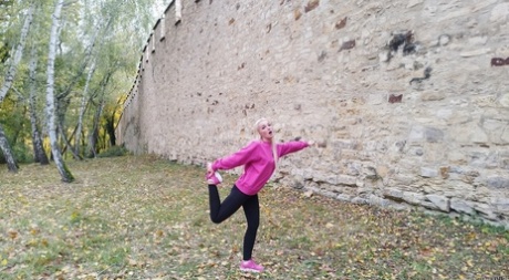 Blonde young adult Lovita Fate participates in MMF intimacy with older guys