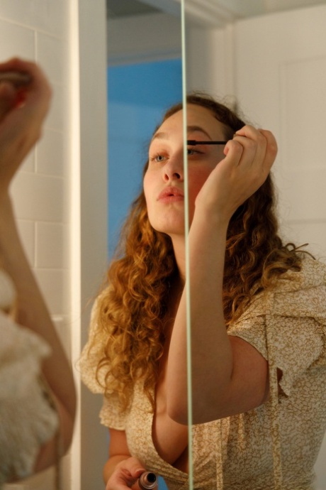 Beautiful curly haired authentic Carrie Barber shows her big curves in panties