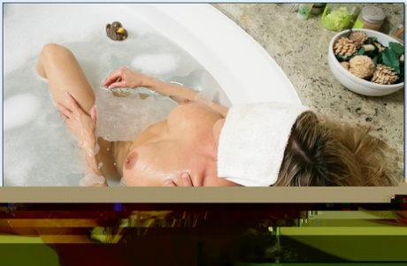 MATURE WOMAN slut Brandi Love gives a oral pleasure in the tub & gets fucked in a POV scene