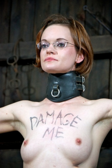 Pain slut Hazel Hypnotic is subjected to plenty of abuse in a barn