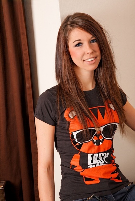 Slippy young adult in jeans getting natural and spreading her soft femininity lips