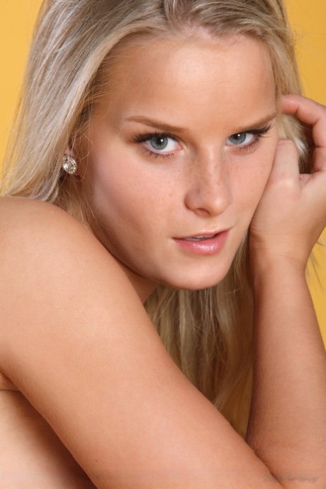 Erotic solo girl Miela A flaunting big breasts & tight femininity for close up view