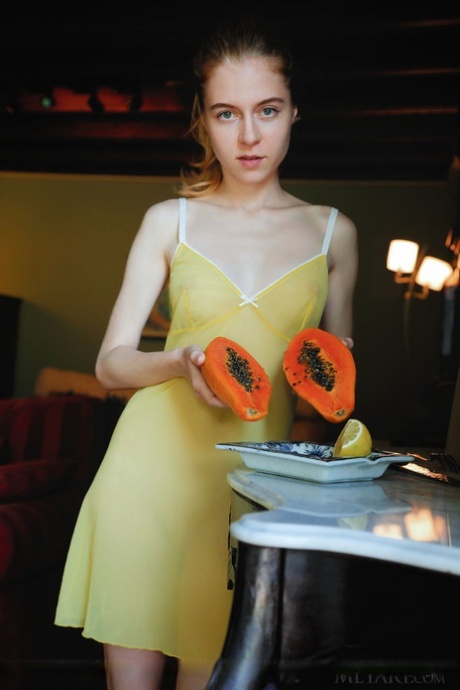 Skinny young Shayla strips her dress to reveal small breasts and tight young curves