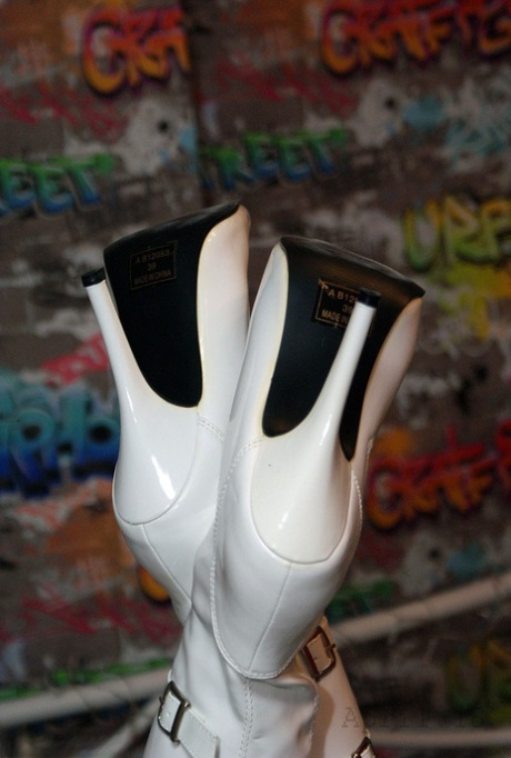 Bold granny Savana in thigh poses in fishnet body stocking & thigh high boots