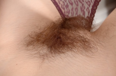 Nerdy girl Billie Rae shows her unshaven body in the artistic with her glasses on