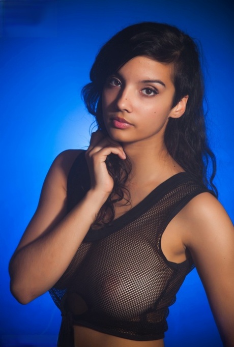 Indian female models non artistic in a see thru top and shorts