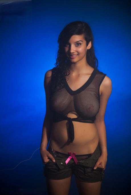 Indian female models non artistic in a see thru top and shorts