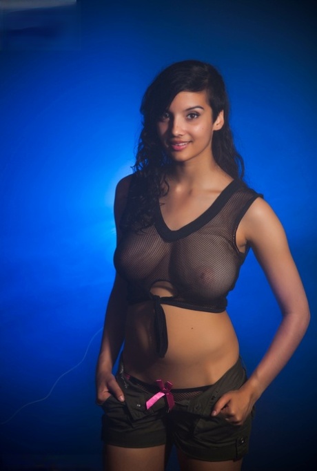 Indian female models non artistic in a see thru top and shorts