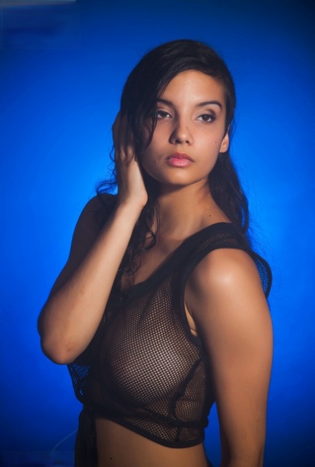 Indian female models non artistic in a see thru top and shorts