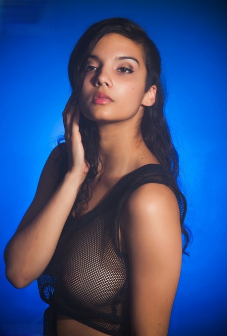 Indian female models non artistic in a see thru top and shorts