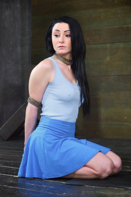 Dark haired girl with firm breasts Veruca James gets face fucked while in bondage