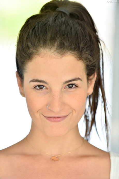 MATURE WOMAN with an amazing figure Antonella flaunts her big juggs & pierced nipples