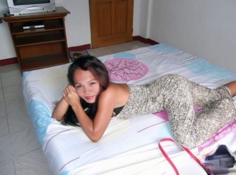 Small breasted Filipina Mylyn gets natural and showcases her bushy femininity