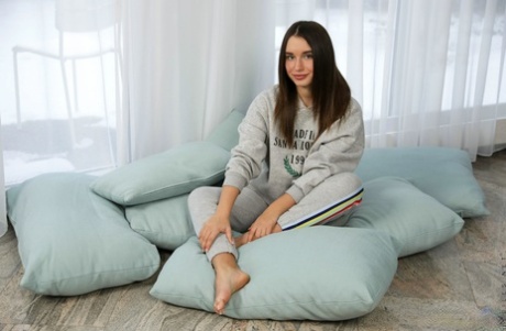 Brunette model Lana Roy removes sweats and lingerie before masturbating