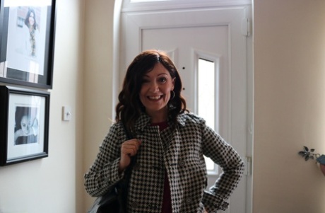 Alluring MATURE WOMAN Kitty Cream models for a non-nude shoot while at home and alone