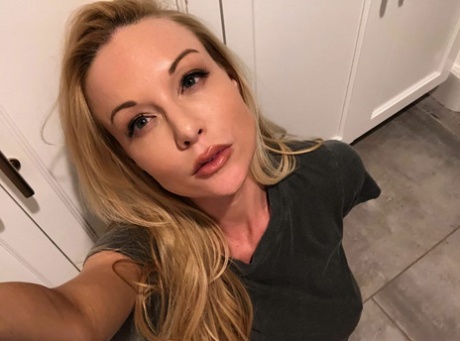 Attractive blond Kayden Kross sports long nipples while taking masturbation selfies
