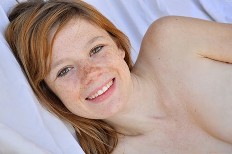 Horny authentic with freckled face Gwen slides a finger in her butthole outdoors