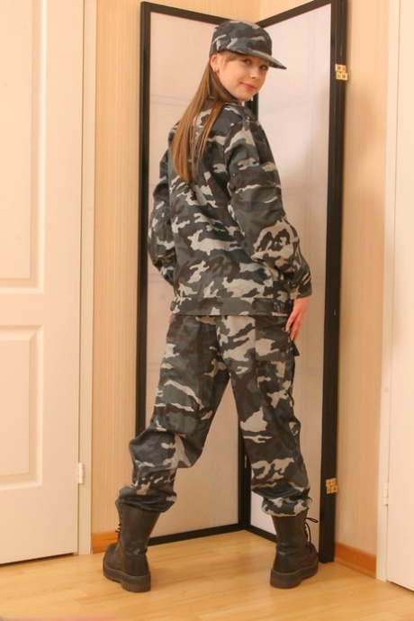 Petite military lady Tina unveils her trimmed femininity in a alluring striptease