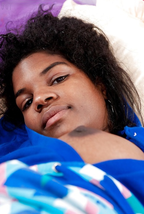 Authentic ebony chick Manuela gets natural to spread her black femininity