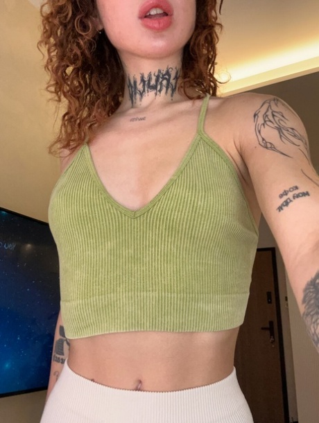 Alluring curly haired OnlyFans cam babe Curly Polly shows her yummy femininity