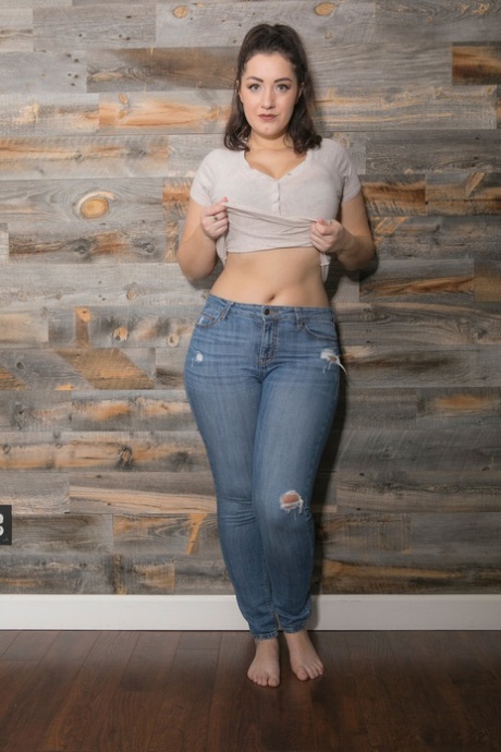 Authentic BBW Lexi Lloyd uncovers big natural breasts and fat curves while stripping