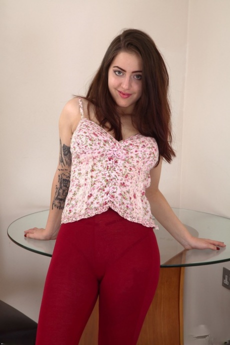 Authentic brunette Rabiosa reveals her bush and teases with her pierced nips