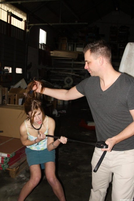 Naughty pantiless young adult Anouk bound with rope & gagged with tape in the barn