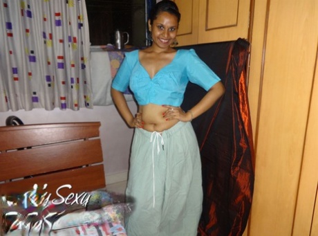 Indian solo girl Lily Singh exposes her natural breasts in a skirt
