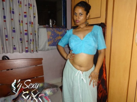 Indian solo girl Lily Singh exposes her natural breasts in a skirt