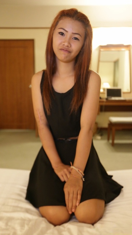 Petite Filipina girl exposes her flat chest and tight femininity for the first time