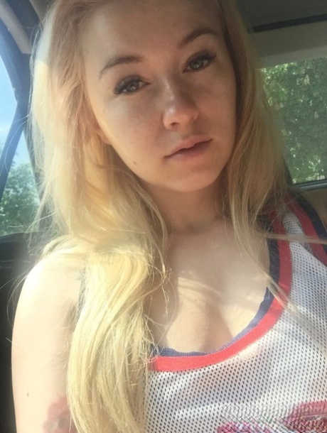 Beautiful blonde slut Misha Cross takes a selfie fully clothed and stark natural