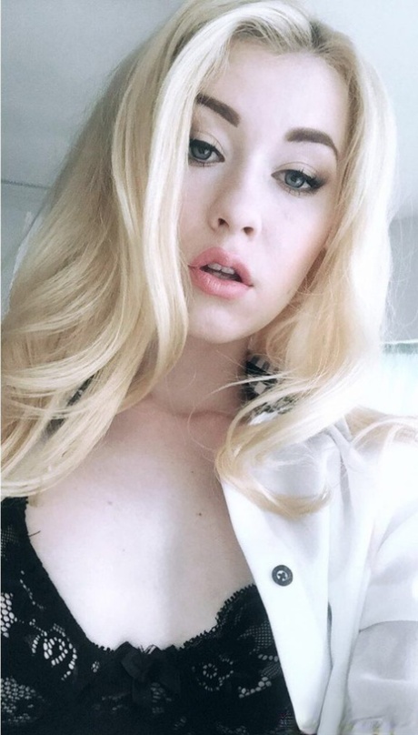 Beautiful blonde slut Misha Cross takes a selfie fully clothed and stark natural